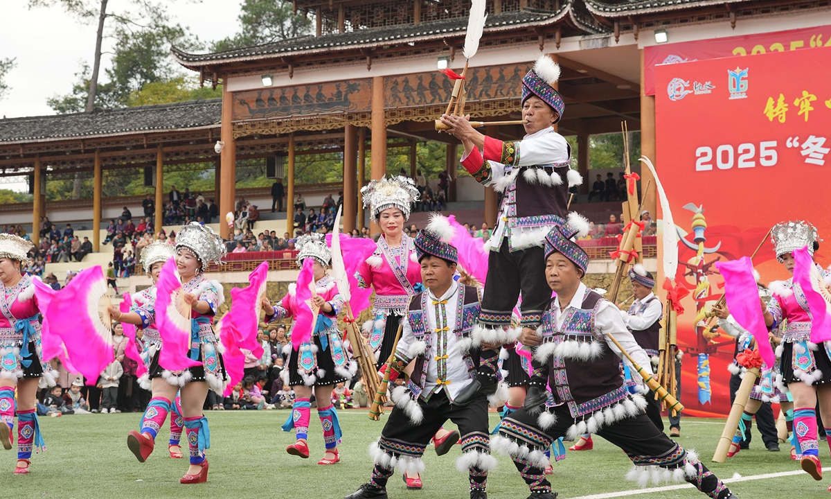 Locals from Rongshui Miao Autonomous County in South China's Guangxi Zhuang Autonomous Region participate in the Lusheng Dance Competition of the 23rd Lusheng and Horse Fighting Festival on November 30, 2025. Participants dress in colorful costumes to sing and dance in celebration of the harvest and to express their hopes for a joyful life. 
Photo: VCG