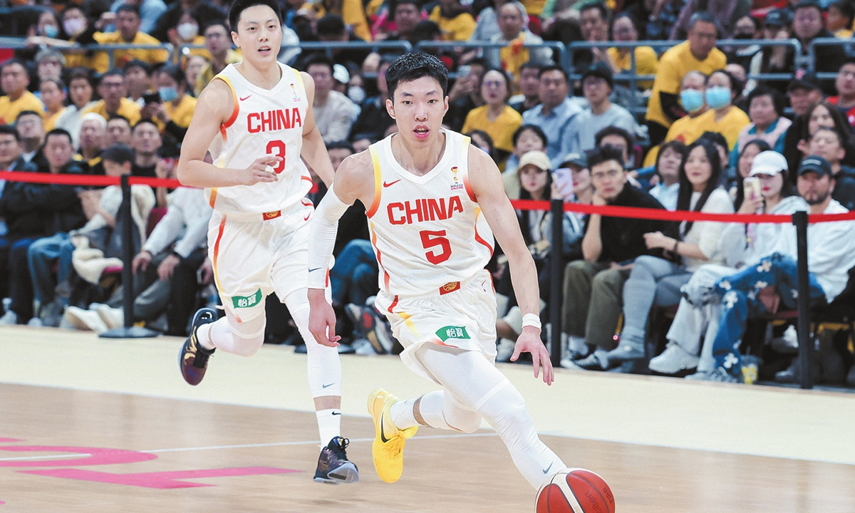 Liao Sanning (No.5) dribbles during the match against South Korea, on November 28, 2025.