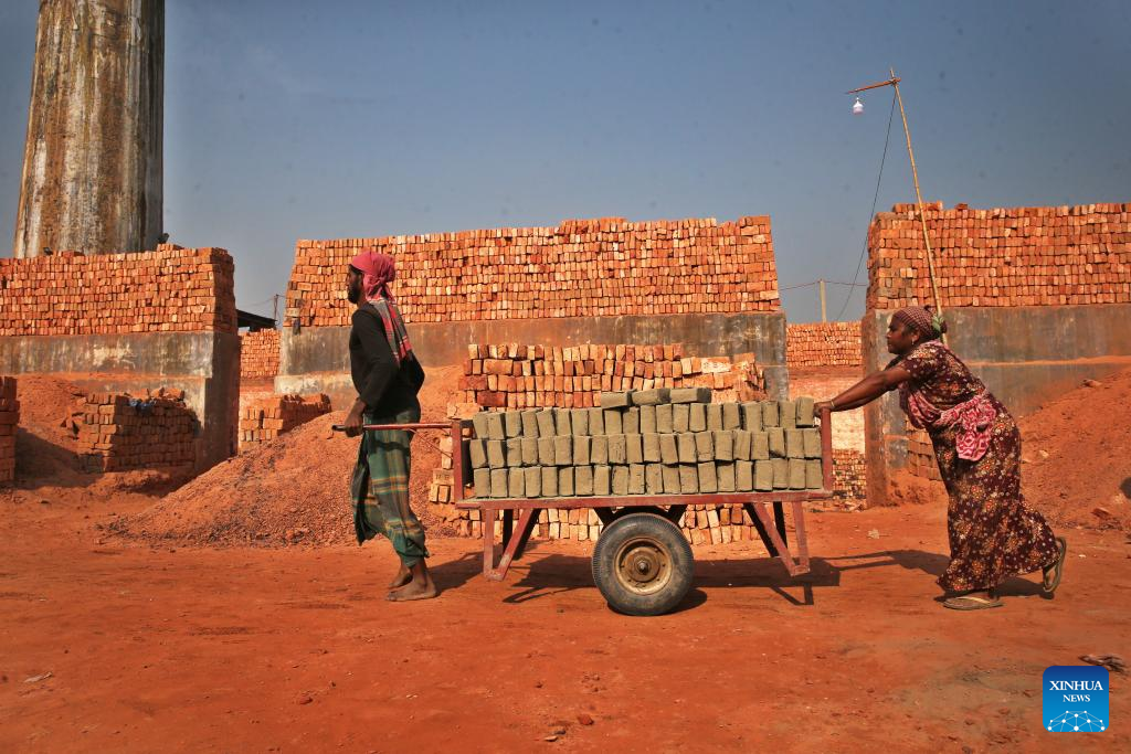 People work at a brick field in Dhaka, Bangladesh on Dec. 1, 2025. (Photo by Habibur Rahman/Xinhua)