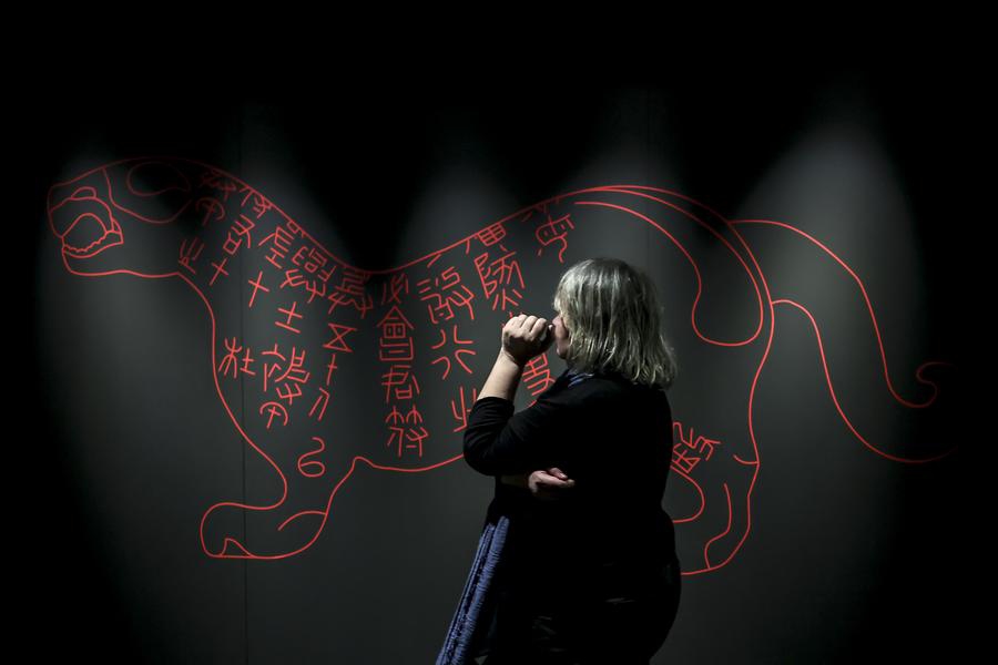 A woman visits the exhibition Civilization of the Qin and Han Dynasties - The First Chinese Emperor's Terracotta Warriors at the Museum of Fine Arts in Budapest, Hungary, Nov. 27, 2025.  (Photo by David Balogh/Xinhua)