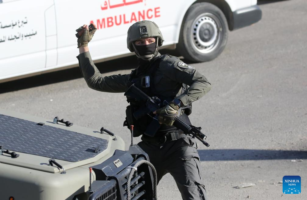 An Israeli soldier is seen during a military raid in the West Bank city of Nablus, Dec. 2, 2025. (Photo by Nidal Eshtayeh/Xinhua)