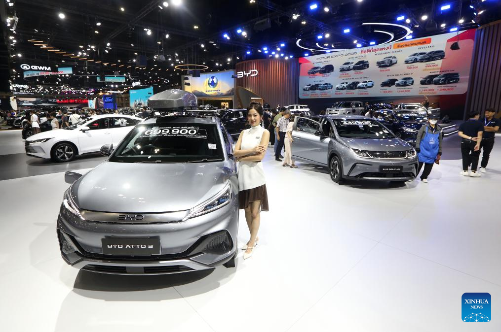 People visit the booth of Chinese carmaker BYD at the 42nd Thailand International Motor Expo in Bangkok, Thailand, Dec. 2, 2025. (Xinhua/Rachen Sageamsak)