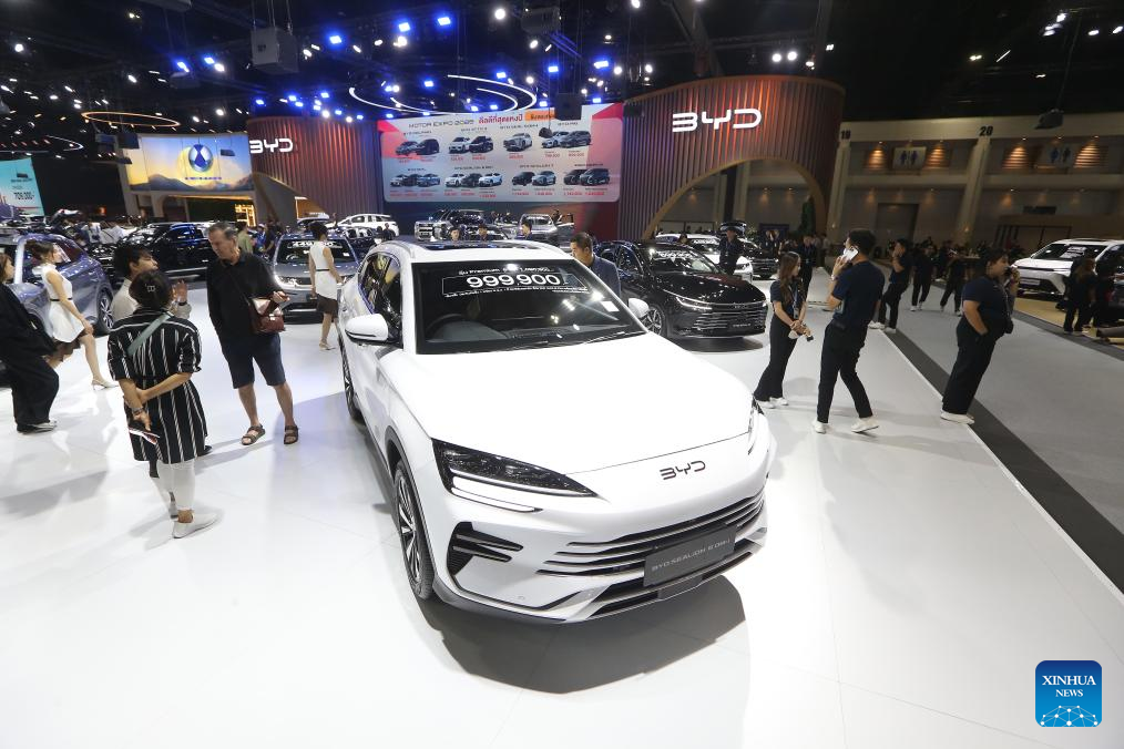 People visit the booth of Chinese carmaker BYD at the 42nd Thailand International Motor Expo in Bangkok, Thailand, Dec. 2, 2025. (Xinhua/Rachen Sageamsak)