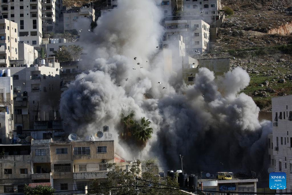 Smoke rises as Israeli forces blow up a Palestinian house in the West Bank city of Nablus, Dec. 2, 2025. (Photo by Nidal Eshtayeh/Xinhua)