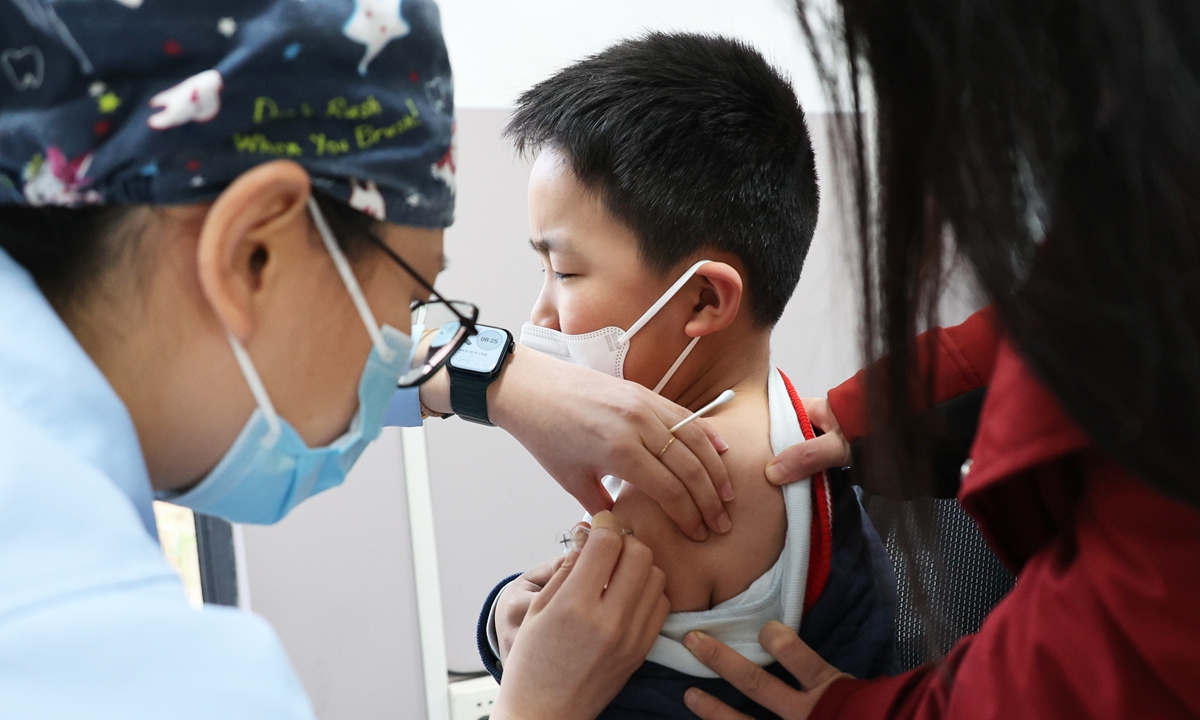 A child from Lianyungang, East China's Jiangsu Province, gets vaccinated against the influenza virus on November 29, 2025. Photo: VCG