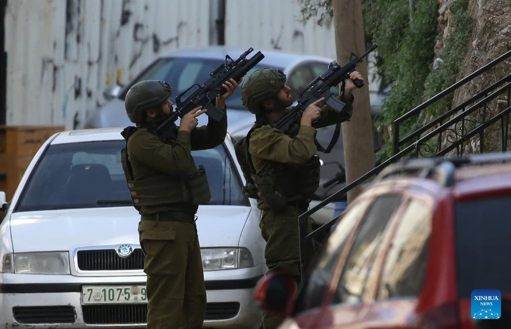 Israeli soldiers participate in a military operation in the West Bank city of Nablus on Dec. 3, 2025. Israeli forces stormed several neighborhoods at dawn in a new raid. (Photo by Nidal Eshtayeh/Xinhua)