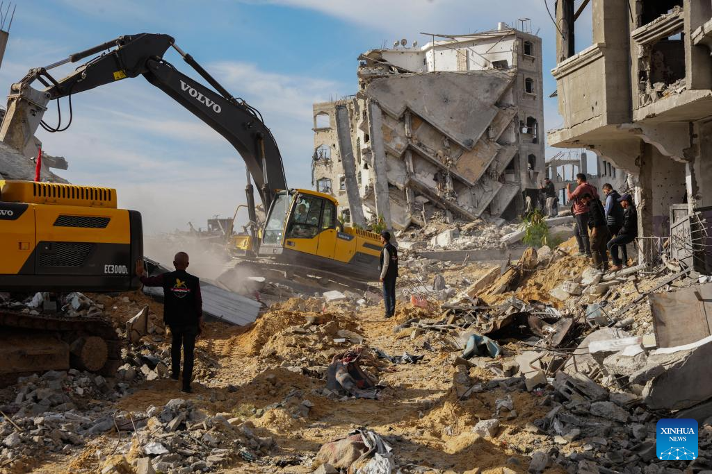 People operating heavy machinery search for the remains of an Israeli detainee in the Jabalia area of northern Gaza Strip, on Dec. 3, 2025. (Photo by Rizek Abdeljawad/Xinhua)