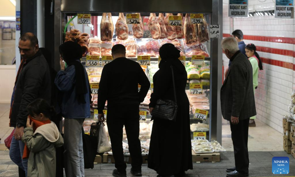 People shop at a local market in Ankara, Türkiye, Dec. 3, 2025. Türkiye's annual inflation was recorded at 31.65 percent in November, down from 32.87 percent in October, data from the Turkish Statistical Institute showed on Wednesday, marking a further easing in underlying price pressures. The data also showed that monthly producer prices rose 0.84 percent, while annual producer inflation stood at 27.23 percent. (Mustafa Kaya/Handout via Xinhua)