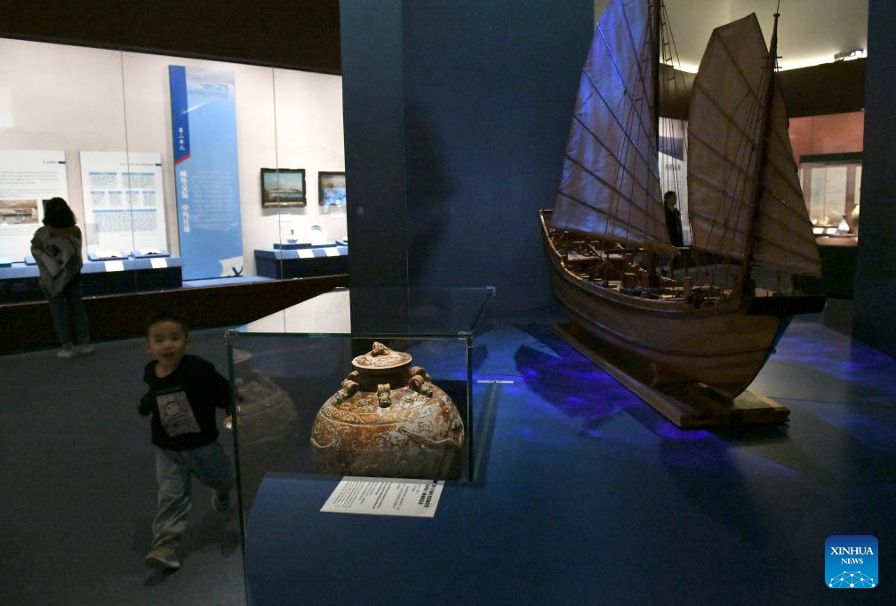 People visit an exhibition titled Shared Prosperity -- A Millennium of Guangdong's Foreign Trade at the Guangdong Museum in Guangzhou, south China's Guangdong Province, Dec. 3, 2025. (Photo by Xu Jianmei/Xinhua)