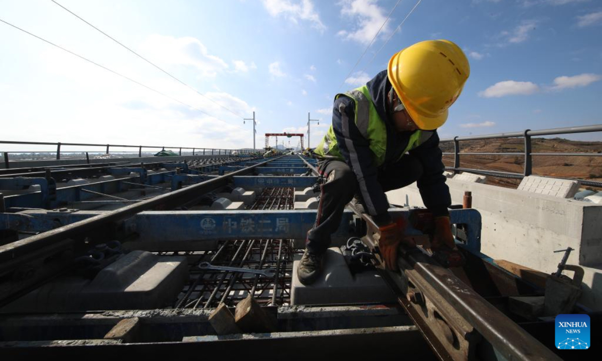 A constructor works at a construction site of Chongqing-Kunming High-Speed Railway in Zhaotong, southwest China's Yunnan Province, Dec. 7, 2025. (Photo by Zhang Guangyu/Xinhua)