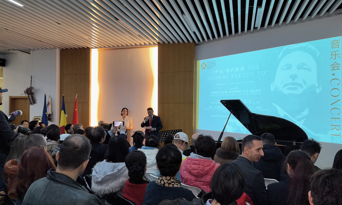 Liviu Taranu, director of the Romanian Cultural Institute, welcomes the audience to the concert in Beijing on November 30, 2025. Photo: Dong Feng/GT