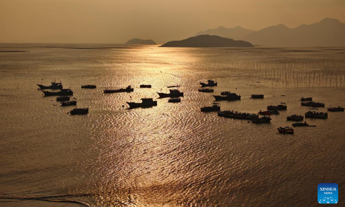 This photo shows a coastal scenery of Dongbi Village in Sansha Town, Xiapu County, southeast China's Fujian Province, Dec. 3, 2025. Sansha Town in Xiapu County, blessed with unique natural resources and rich historical culture, has been walking a distinctive path to rural revitalization by orchestrating tourist attractions such as high-end homestays, tidal flat landscape and local specialty food with rural development. (Xinhua/Wei Peiquan)