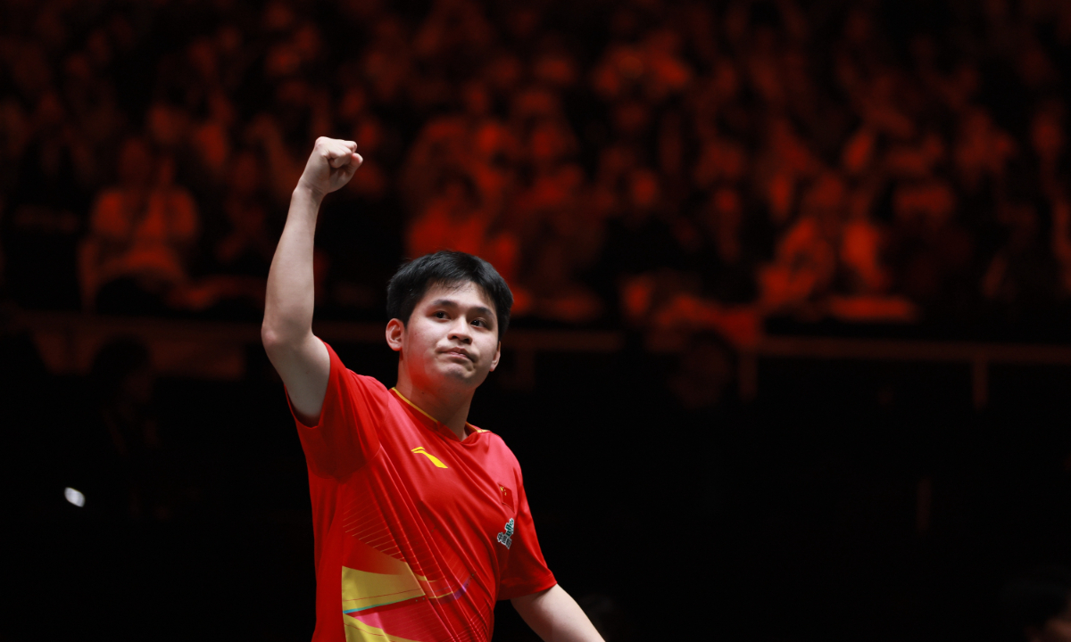 China's Lin Shidong celebrates after scoring against Tomokazu Harimoto on December 7, 2025 at the ITTF Mixed Team World Cup in Chengdu, Southwest China's Sichuan Province. Photo: VCG