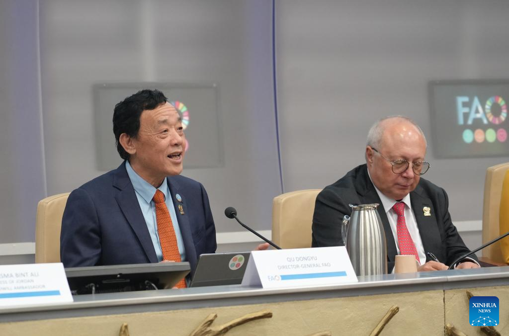 FAO Director-General Qu Dongyu (L) delivers a speech at the World Soil Day celebration held at the FAO headquarters in Rome, Italy, Dec. 5, 2025. Zhang Ganlin, a researcher at the Institute of Soil Science under the Chinese Academy of Sciences, received the 2025 Glinka World Soil Prize on Friday at the World Soil Day celebration held at the headquarters of the Food and Agriculture Organization of the United Nations (FAO) in Rome. (Xinhua/Ren Yaoting)