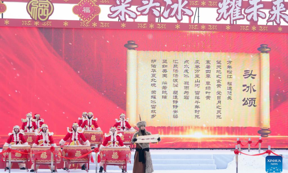 Artists stage a folk performance during an ice collecting festival in Harbin, northeast China's Heilongjiang Province, Dec. 7, 2025. Marking the beginning of Harbin's ice collecting season, the sixth ice collecting festival kicked off here by the Songhua River on Sunday, attracting lots of people with ice collecting ceremony and folk custom experience activities. (Xinhua/Wang Song)