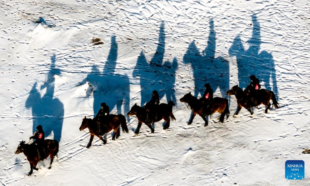 An aerial drone photo taken on Dec. 2, 2025 shows policemen of the 