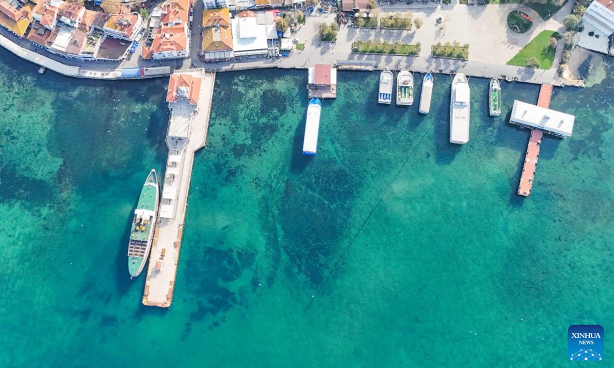 An aerial drone photo taken on Dec. 4, 2025 shows a pier on Buyukada Island in Istanbul, Türkiye. Buyukada Island, located in the Sea of Marmara and well known for its scenic beauty, is a popular getaway destination for locals and visitors. (Xinhua/Liu Lei)