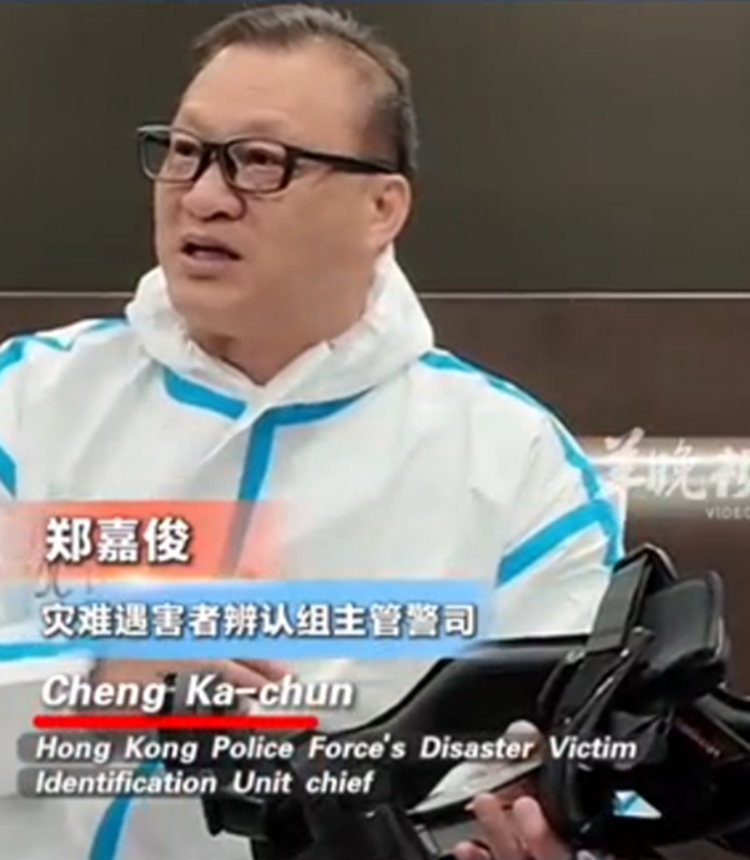 DVIU Chief Cheng Ka-chun demonstrates an exoskeleton suit provided by the Chinese mainland authorities, which is very helpful for the relief work of Tai Po deadly fire. Photo: Screenshot of media interview 