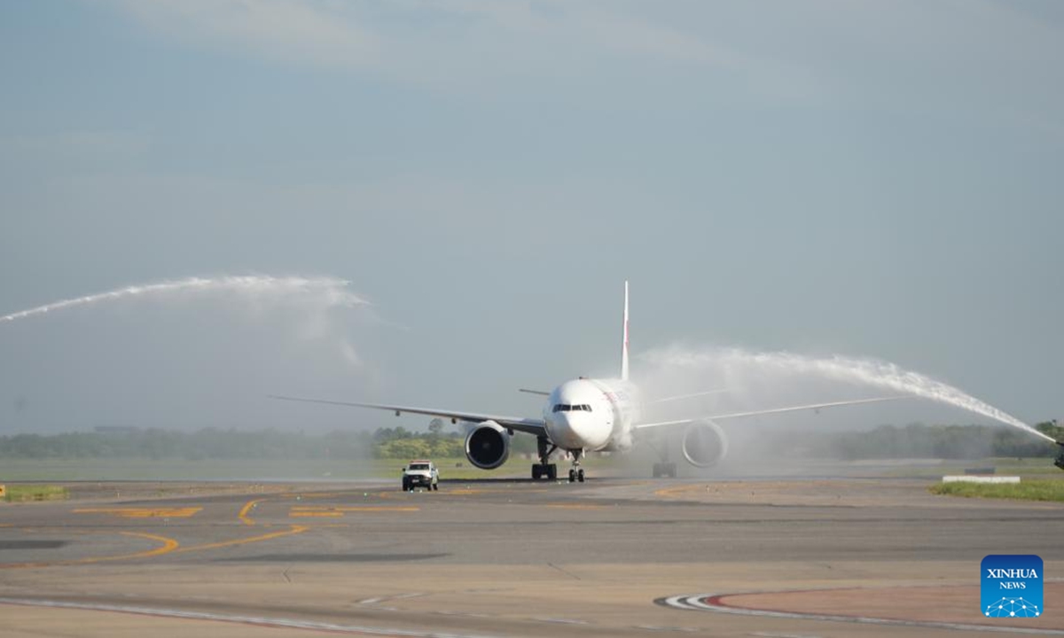 China Eastern Airlines' flight MU745, the first direct air route between China and Argentina, passes through a water gate at Ezeiza International Airport in Buenos Aires, Argentina, Dec. 4, 2025. China Eastern Airlines' flight MU745 touched down in Buenos Aires, the capital of Argentina, on Thursday afternoon, marking the official launch of the first direct air route between China and Argentina, according to the carrier. (Xinhua/Zhang Duo)