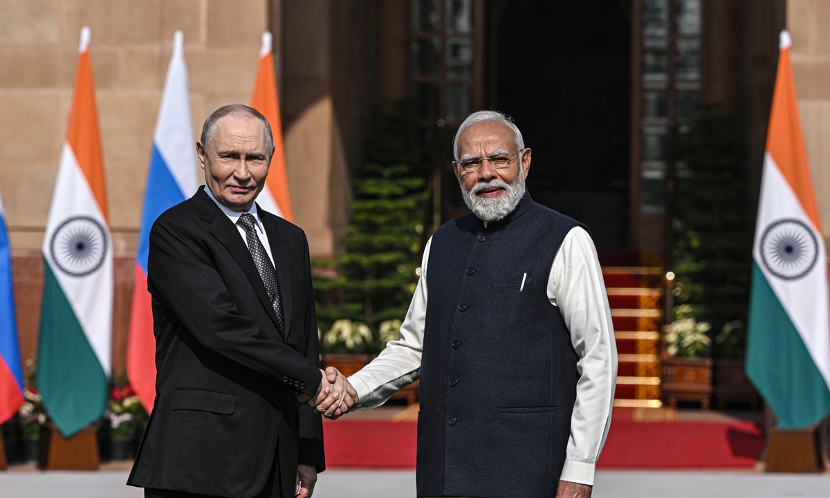 Russian President Vladimir Putin (left) shakes hands with Narendra Modi, India's prime minister, at Hyderabad House in New Delhi, India, on December 5, 2025. Photo: VCG