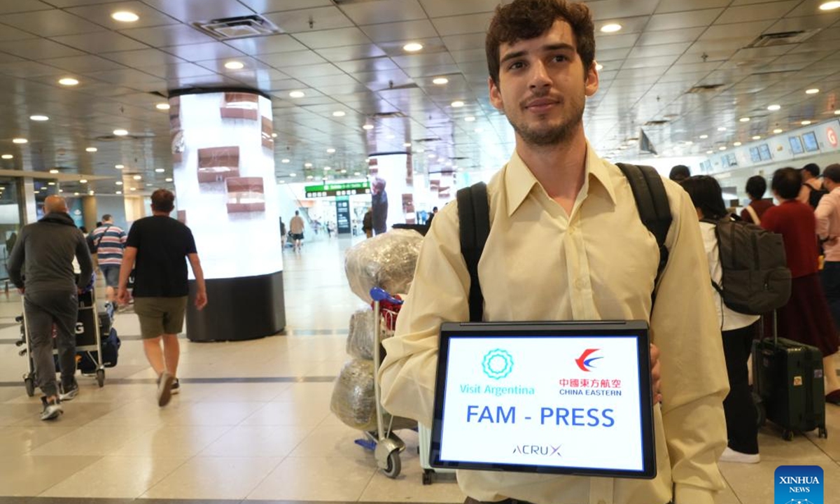 China Eastern Airlines' flight MU745, the first direct air route between China and Argentina, passes through a water gate at Ezeiza International Airport in Buenos Aires, Argentina, Dec. 4, 2025. China Eastern Airlines' flight MU745 touched down in Buenos Aires, the capital of Argentina, on Thursday afternoon, marking the official launch of the first direct air route between China and Argentina, according to the carrier. (Xinhua/Zhang Duo)
