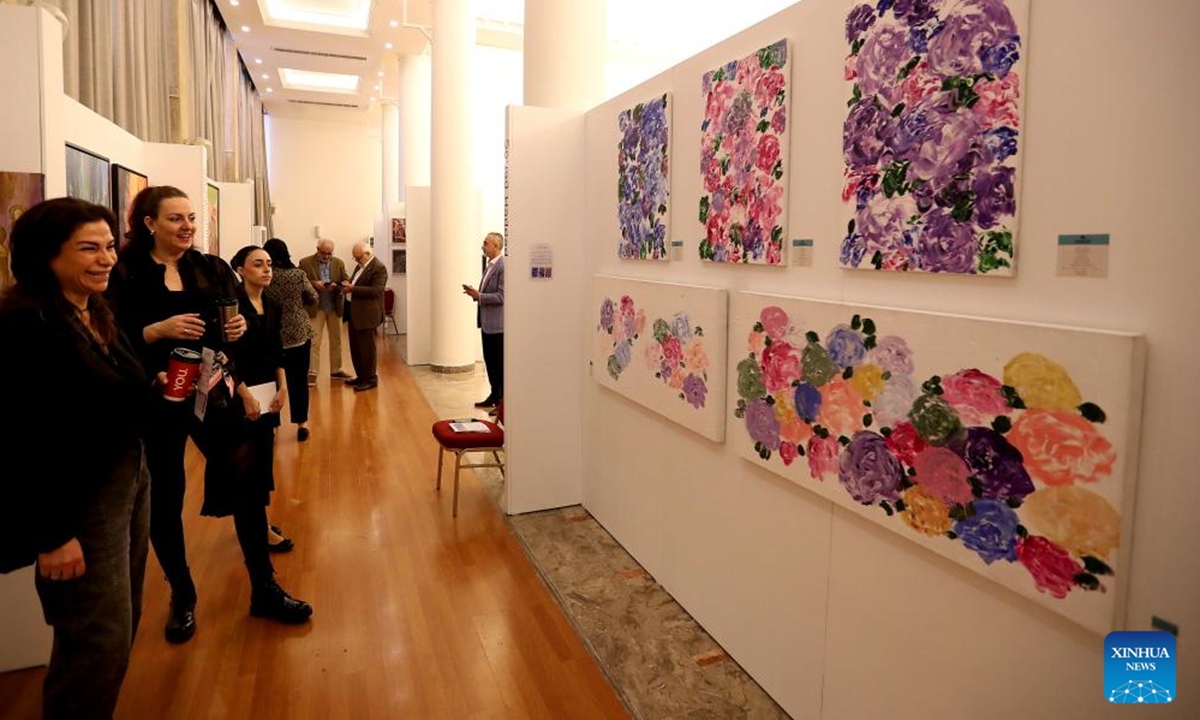 People visit the Arab Art Fair in Beirut, Lebanon, Dec. 4, 2025. The fair offers visitors a unique journey through the colors and stories of contemporary Arab art. (Xinhua/Bilal Jawich)