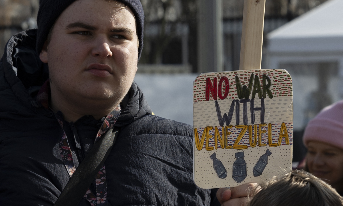 Demonstrators gather outside the White House during the 