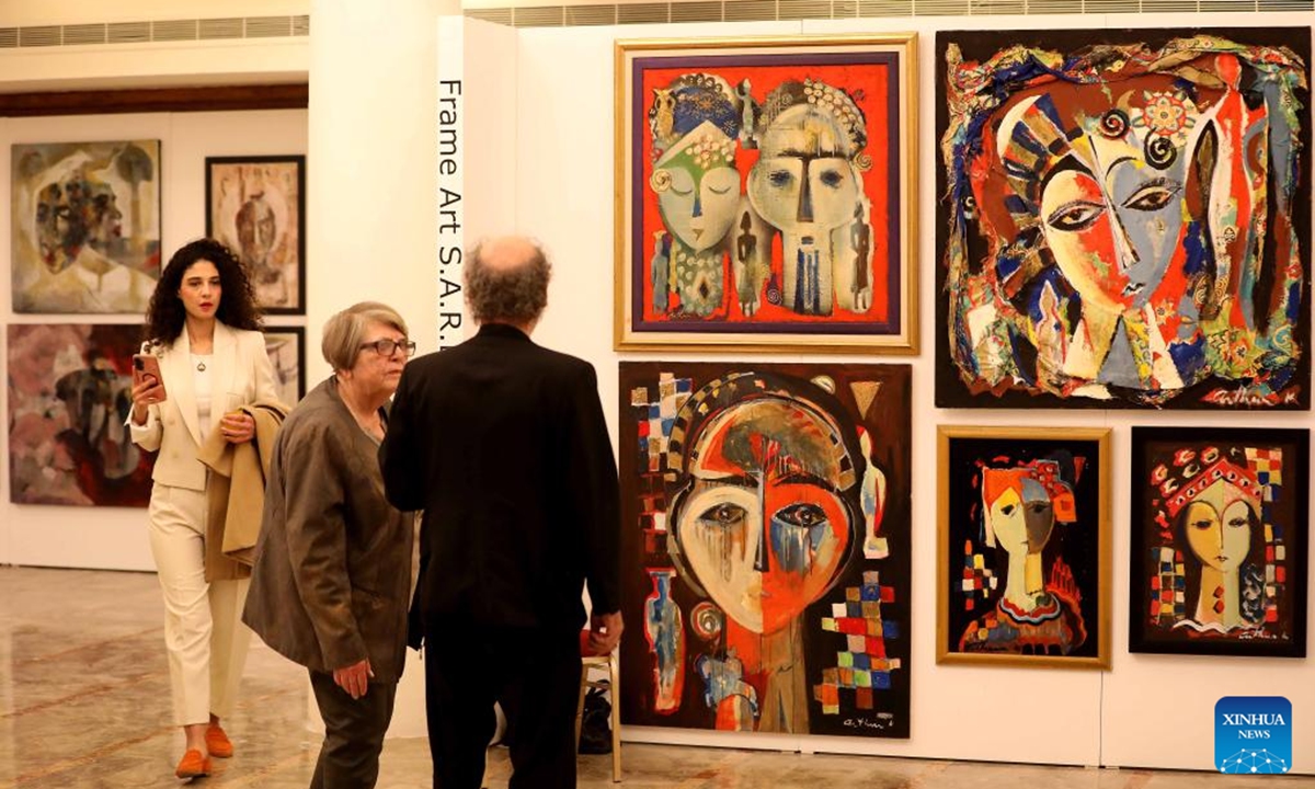 People visit the Arab Art Fair in Beirut, Lebanon, Dec. 4, 2025. The fair offers visitors a unique journey through the colors and stories of contemporary Arab art. (Xinhua/Bilal Jawich)