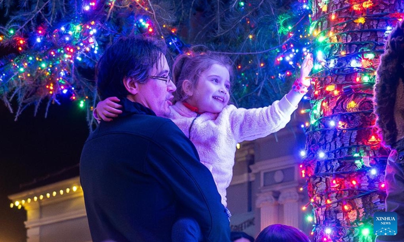 People are seen during a Christmas parade in Pleasanton, California, the United States, Dec. 6, 2025. (Photo by Ziyu Julian Zhu/Xinhua)