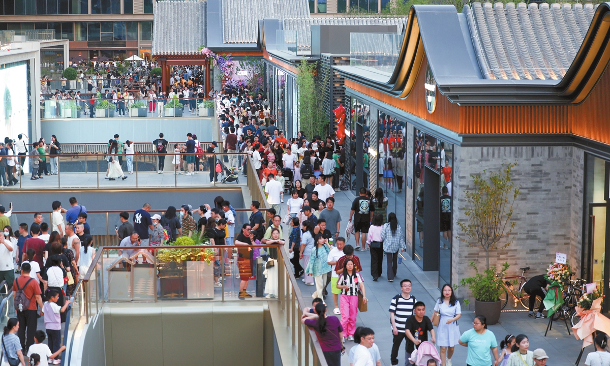 Consumers visit the Dajixiang commercial complex in Beijing on June 7, 2025. Photo: VCG