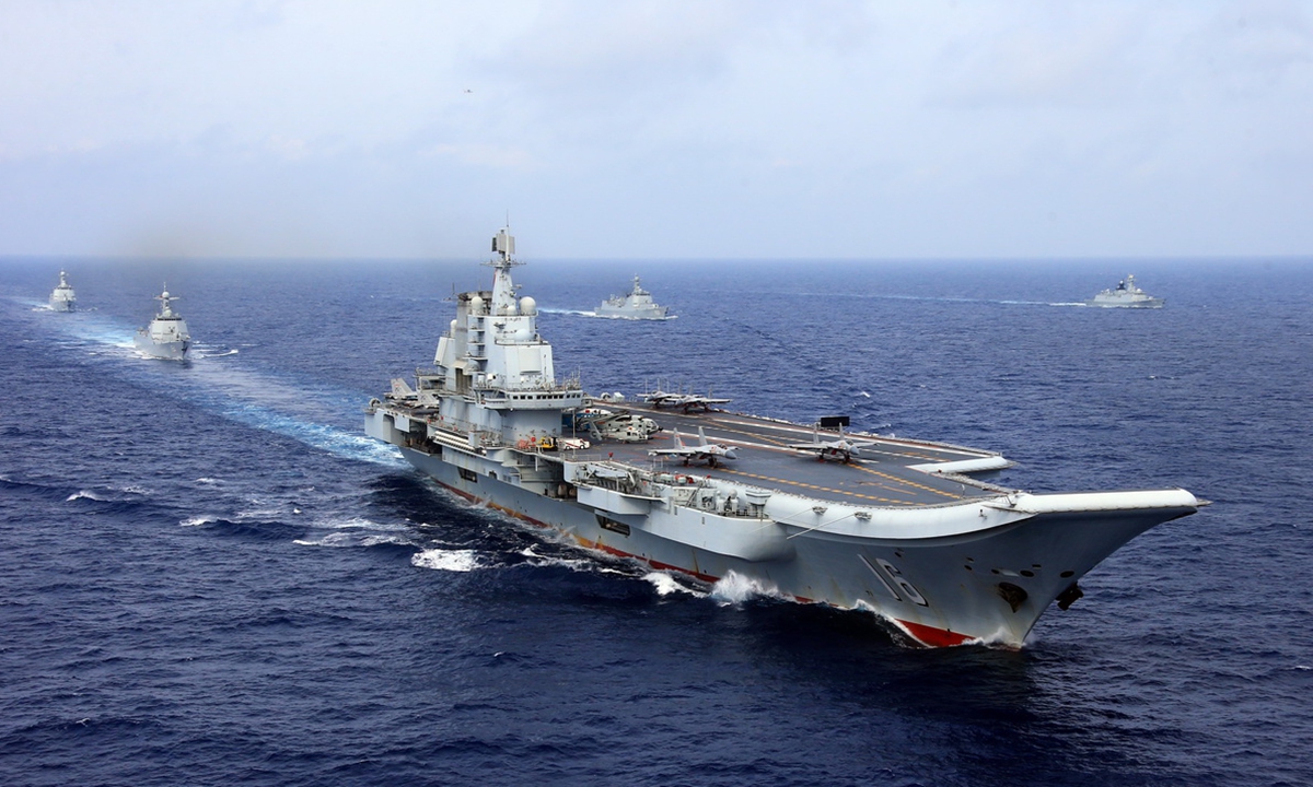 The aircraft carrier <em>Liaoning</em> battle group steam on the sea. The aircraft carrier <em>Liaoning</em> (Hull 16), several guided-missile destroyers, frigates and dozens of aircraft attached to the Navy of the Chinese People's Liberation Army took part in a combat exercise at an unidentified area east of the Bashi Channel in the western Pacific on Apr. 20, 2018. The exercise was a routine arrangement as a part of the PLA Navy's annual training plan. (eng.chinamil.com.cn/Photo by Zhang Lei)

