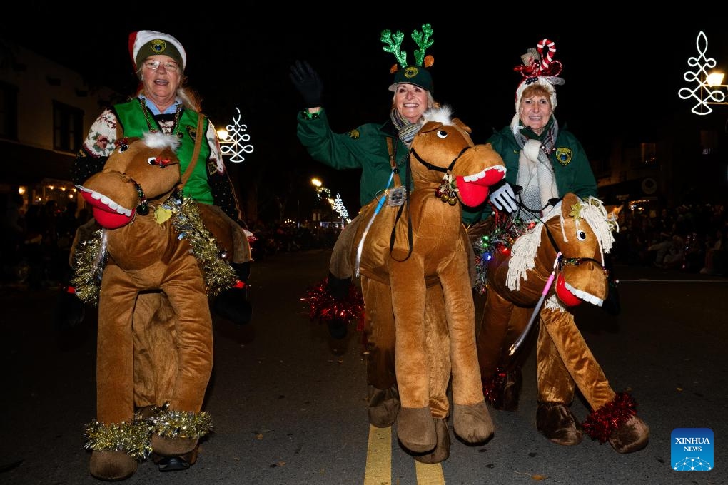 People are seen during a Christmas parade in Pleasanton, California, the United States, Dec. 6, 2025. (Photo by Ziyu Julian Zhu/Xinhua)