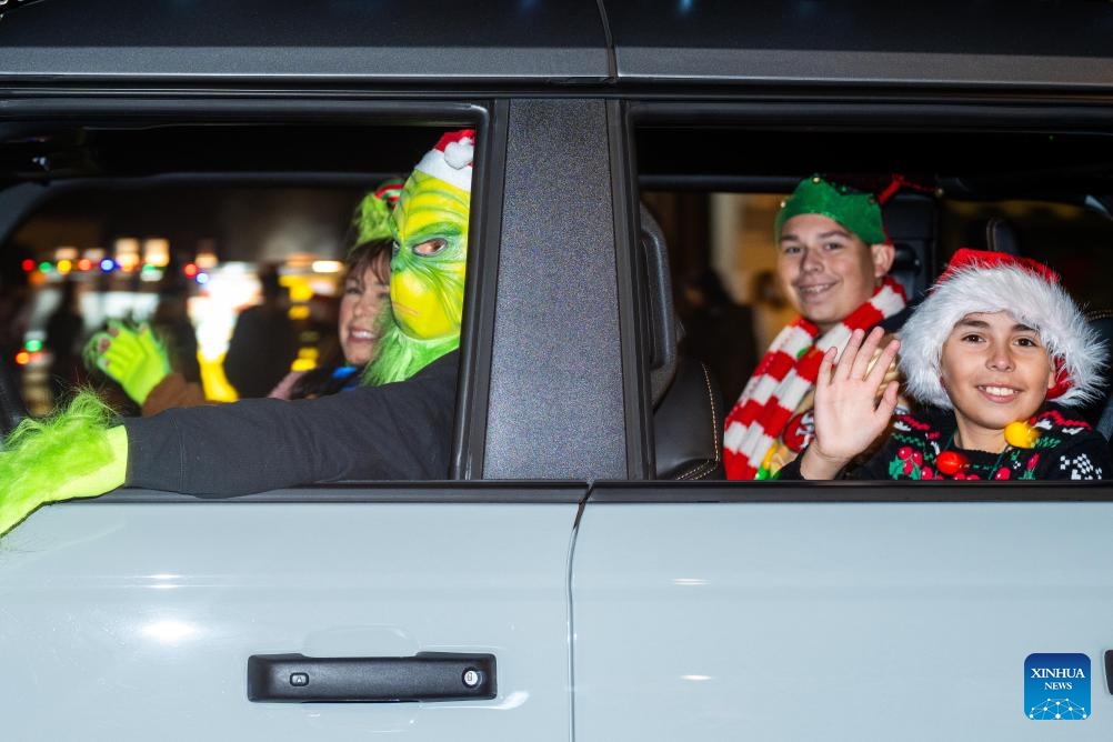 People are seen during a Christmas parade in Pleasanton, California, the United States, Dec. 6, 2025. (Photo by Ziyu Julian Zhu/Xinhua)