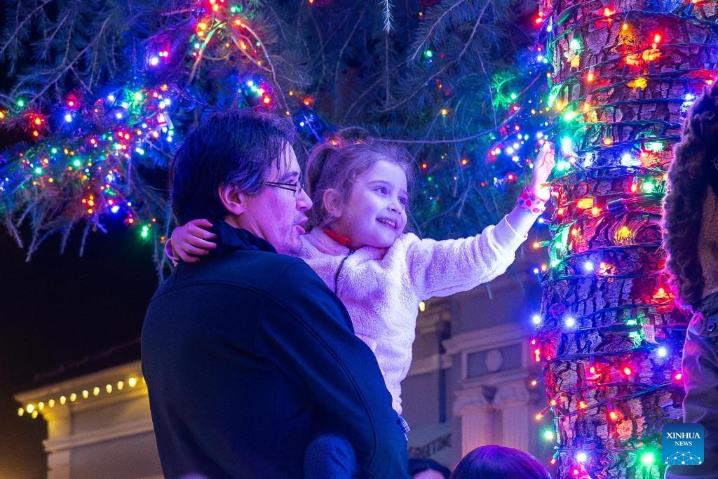 People are seen during a Christmas parade in Pleasanton, California, the United States, Dec. 6, 2025. (Photo by Ziyu Julian Zhu/Xinhua)