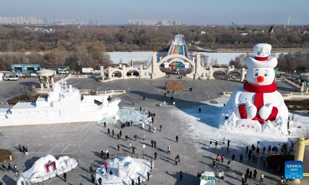 An aerial drone photo taken on Dec. 9, 2025 shows Mr. Snowman at the Sun Island scenic spot in Harbin, northeast China's Heilongjiang Province. Mr. Snowman, an iconic snow sculpture landscape of the 38th Sun Island International Snow Sculpture Art Expo with a height of 23.8 meters and made with 5,000 cubic meters of snow, was officially unveiled at the Sun Island scenic spot on Tuesday. (Photo by Liu Yang/Xinhua)