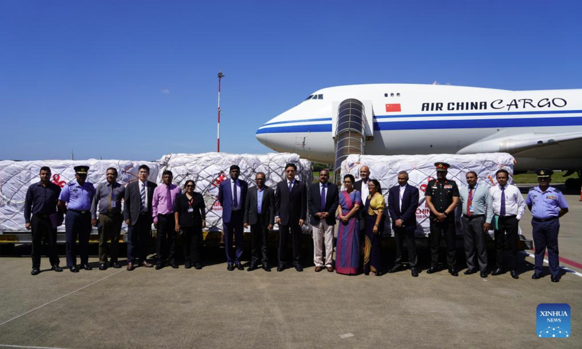 This photo taken on Dec. 8, 2025 shows a handover ceremony of emergency humanitarian flood relief supplies provided by the Chinese government in Colombo, Sri Lanka. (Xinhua/Xu Han)