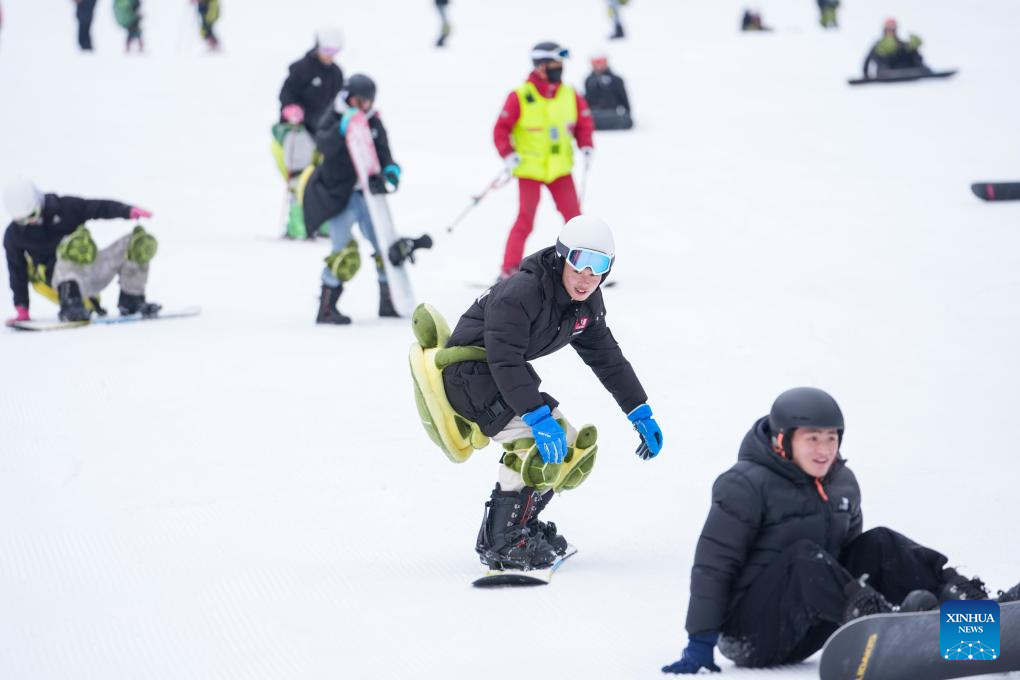 People ski at Qiangrengu ski resort in Wenchuan County, Aba Tibetan and Qiang Autonomous Prefecture, southwest China's Sichuan Province, Dec. 8, 2025. The 2025 Sichuan Winter Tourism Season kicked off here on Monday. Sichuan has launched four major tourism routes and more than 5,000 winter cultural and tourism activities to enrich visitors' winter travel experience. (Xinhua/Jiang Hongjing)