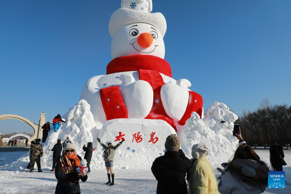 This photo taken on Dec. 9, 2025 shows Mr. Snowman at the Sun Island scenic spot in Harbin, northeast China's Heilongjiang Province. Mr. Snowman, an iconic snow sculpture landscape of the 38th Sun Island International Snow Sculpture Art Expo with a height of 23.8 meters and made with 5,000 cubic meters of snow, was officially unveiled at the Sun Island scenic spot on Tuesday. (Photo by Wang Dong/Xinhua)