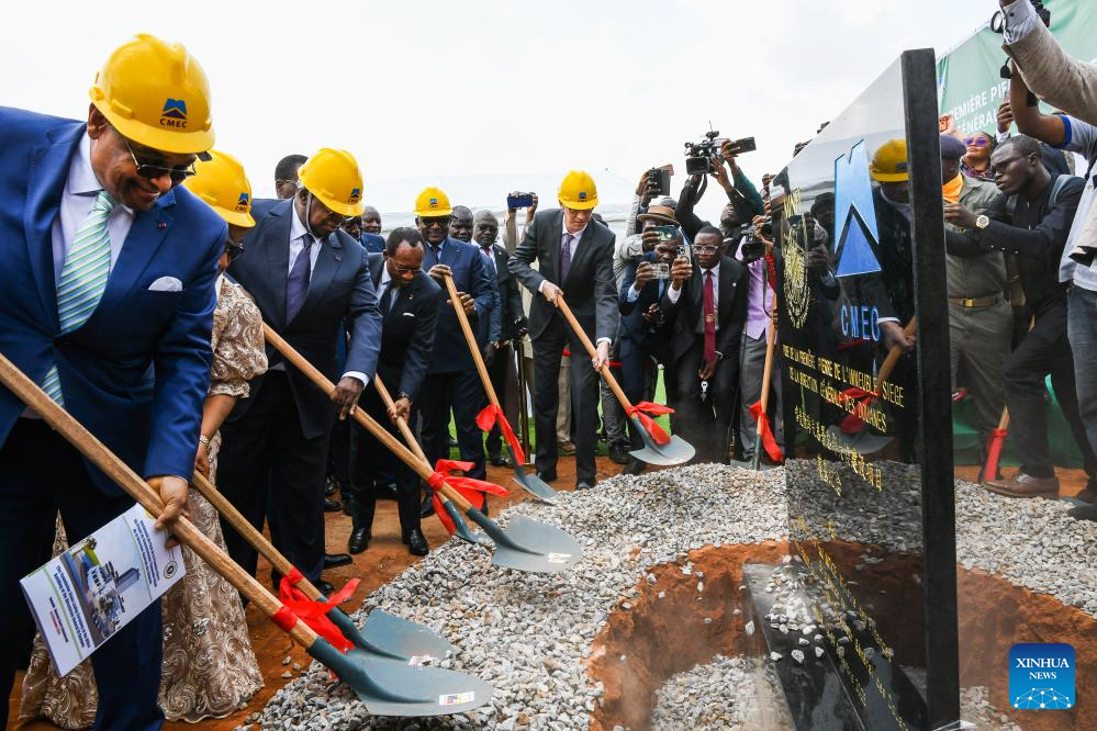 Representatives from Cameroonian government and China Machinery Engineering Corporation (CMEC) lay the foundation stone for the construction of the headquarters of Cameroon's General Directorate of Customs in Yaounde, Cameroon's capital, on Dec. 9, 2025. (Xinhua/Kepseu)