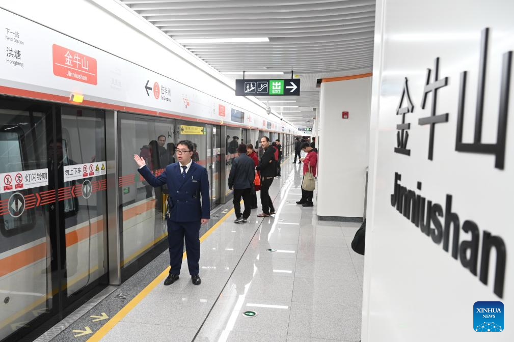 Passengers are pictured at a station of Fuzhou Metro Line 4 in Fuzhou City, southeast China's Fujian Province, Dec. 10, 2025. The Line 4 of Fuzhou Metro began operation on Wednesday. (Xinhua/Lin Shanchuan)