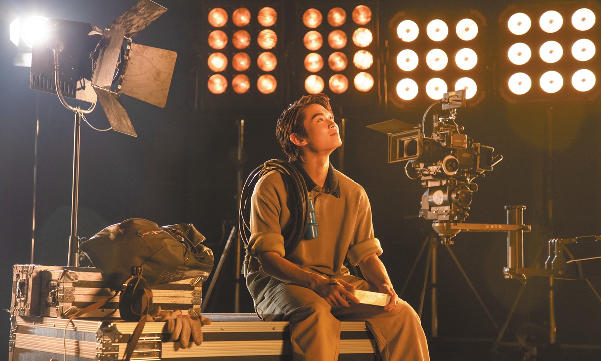 A stage still features Feng Haoran as the lighting technician Dachun in the dance drama <em>Wing Chun</em>. Photo: Courtesy of the SZODT 