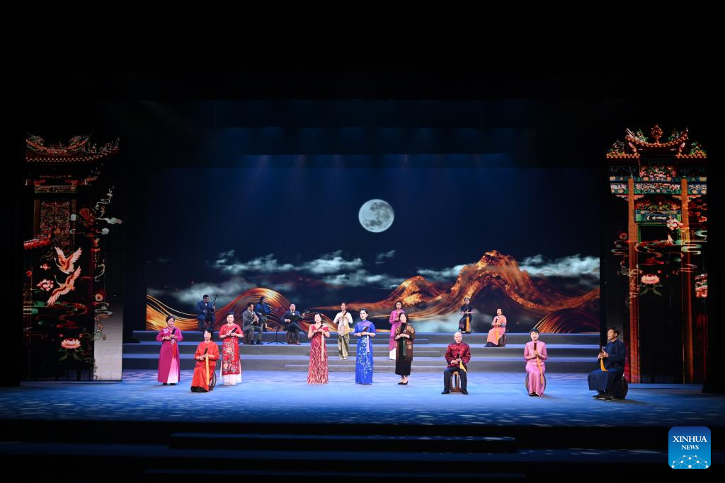Artists perform during the opening ceremony of 15th Quanzhou International Nanyin Symposium in Quanzhou, southeast China's Fujian Province, Dec, 10, 2025. The 15th Quanzhou International Nanyin Symposium was unveiled Wednesday with a special performance staged in Quanzhou. This edition of the event brought together 42 Nanyin troupes from home and abroad, with over 600 performers sharing the stage to jointly present the ancient melodies and new voices of Nanyin.
Nanyin, known as the living fossil of ancient Chinese music, literally means music in the south and is a traditional opera in Fujian dialect. (Xinhua/Jiang Kehong)