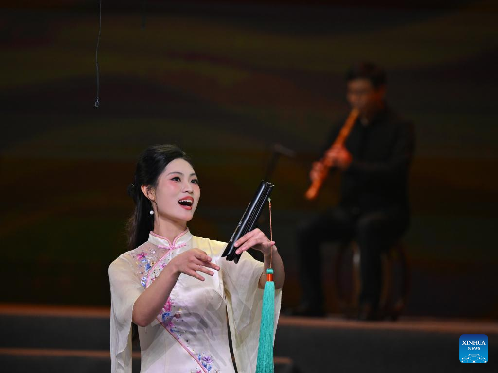 An artist performs during the opening ceremony of 15th Quanzhou International Nanyin Symposium in Quanzhou, southeast China's Fujian Province, Dec, 10, 2025. The 15th Quanzhou International Nanyin Symposium was unveiled Wednesday with a special performance staged in Quanzhou. This edition of the event brought together 42 Nanyin troupes from home and abroad, with over 600 performers sharing the stage to jointly present the ancient melodies and new voices of Nanyin.
Nanyin, known as the living fossil of ancient Chinese music, literally means music in the south and is a traditional opera in Fujian dialect. (Xinhua/Jiang Kehong)