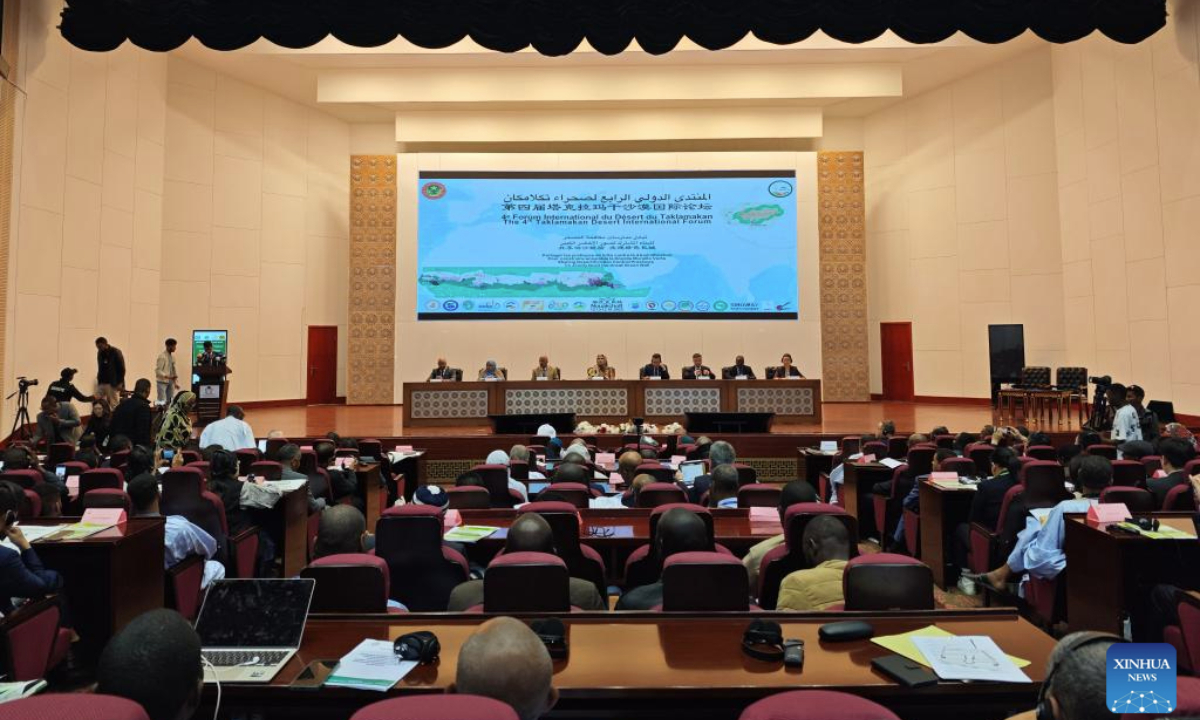 Officials and experts from China and Africa attend the Fourth Taklamakan Desert International Forum in Nouakchott, Mauritania, Dec. 14, 2025. Officials and experts from China and Africa on Sunday called for stronger scientific and technological cooperation to address desertification and land degradation, urging closer coordination to advance Africa's Great Green Wall initiative. The calls were made at the fourth Taklamakan Desert International Forum, held in Nouakchott, the capital of Mauritania, where participants stressed that desertification remains a shared global challenge requiring joint action and the sharing of experience.(Xinjiang Institute of Ecology and Geography/Handout via Xinhua)