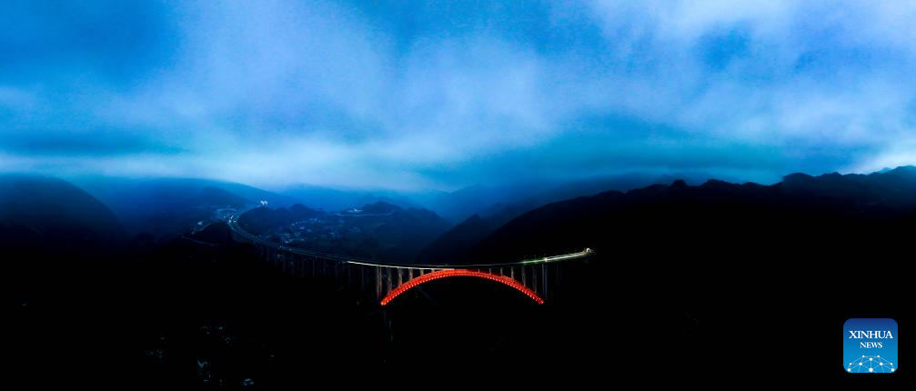 This aerial panoramic drone photo taken on Feb. 2, 2023 shows the Dafaqu Grand Bridge in southwest China's Guizhou Province.
Guizhou, the only province in China without a single plain and home to deep ravines, has long relied on tunnels and bridges to overcome its jagged karst landscape.
Since 2012, the province has accelerated its bridge construction endeavors. Guizhou now has over 32,000 bridges either already built or under construction -- a tenfold increase compared to the 1980s.
Due to its sheer number of bridges, diverse bridge types and complex construction technologies, Guizhou has earned the title of the world's bridge museum. (Xinhua/Ou Dongqu)