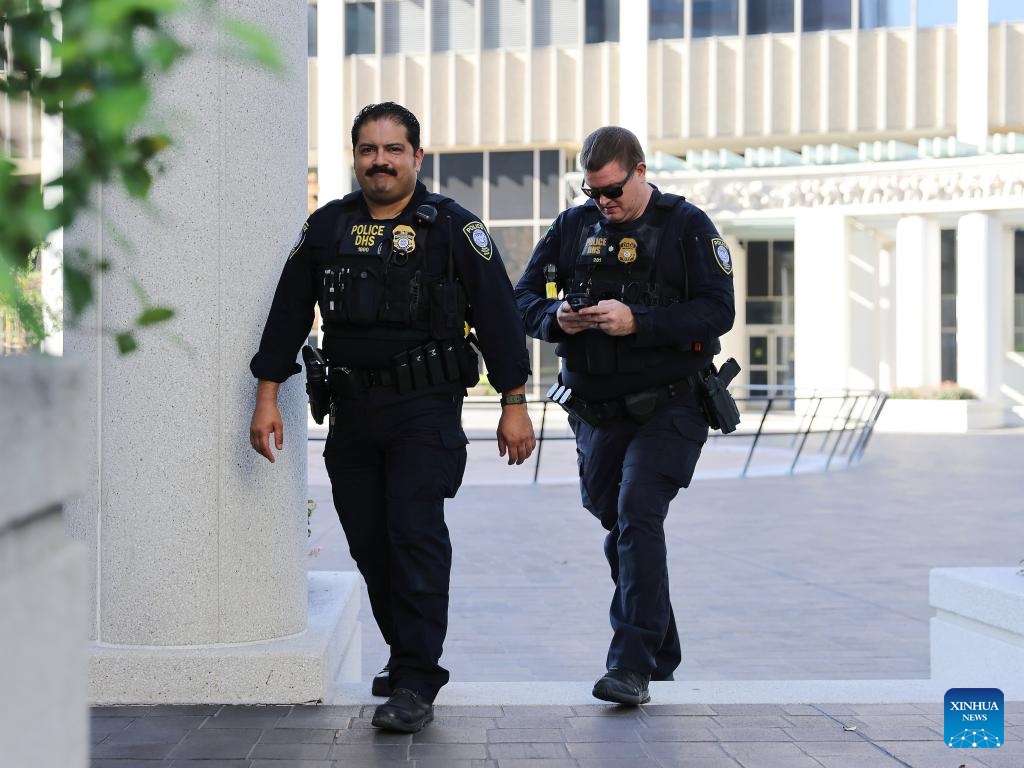 Police officers of the U.S. Department of Homeland Security are on duty at the Metropolitan Detention Center in Los Angeles, California, the United States on Dec. 15, 2025. Four people accused of plotting New Year's Eve bombings in California have been arrested, U.S. authorities said Monday. (Photo by Qiu Chen/Xinhua)