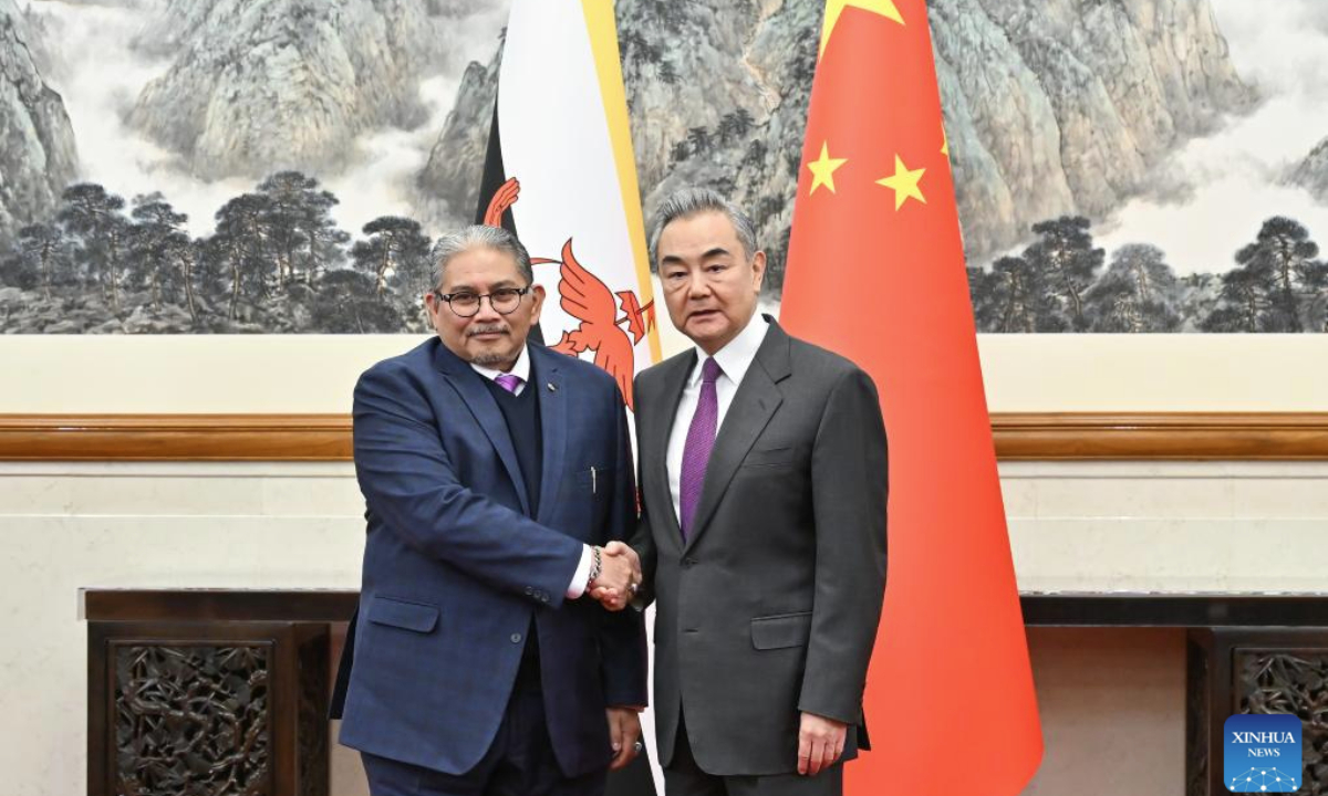 Chinese Foreign Minister Wang Yi, also a member of the Political Bureau of the Communist Party of China Central Committee, holds talks with Dato Erywan Pehin Yusof, Brunei's second minister of foreign affairs, in Beijing, capital of China, Dec. 11, 2025. (Xinhua/Li Xin)