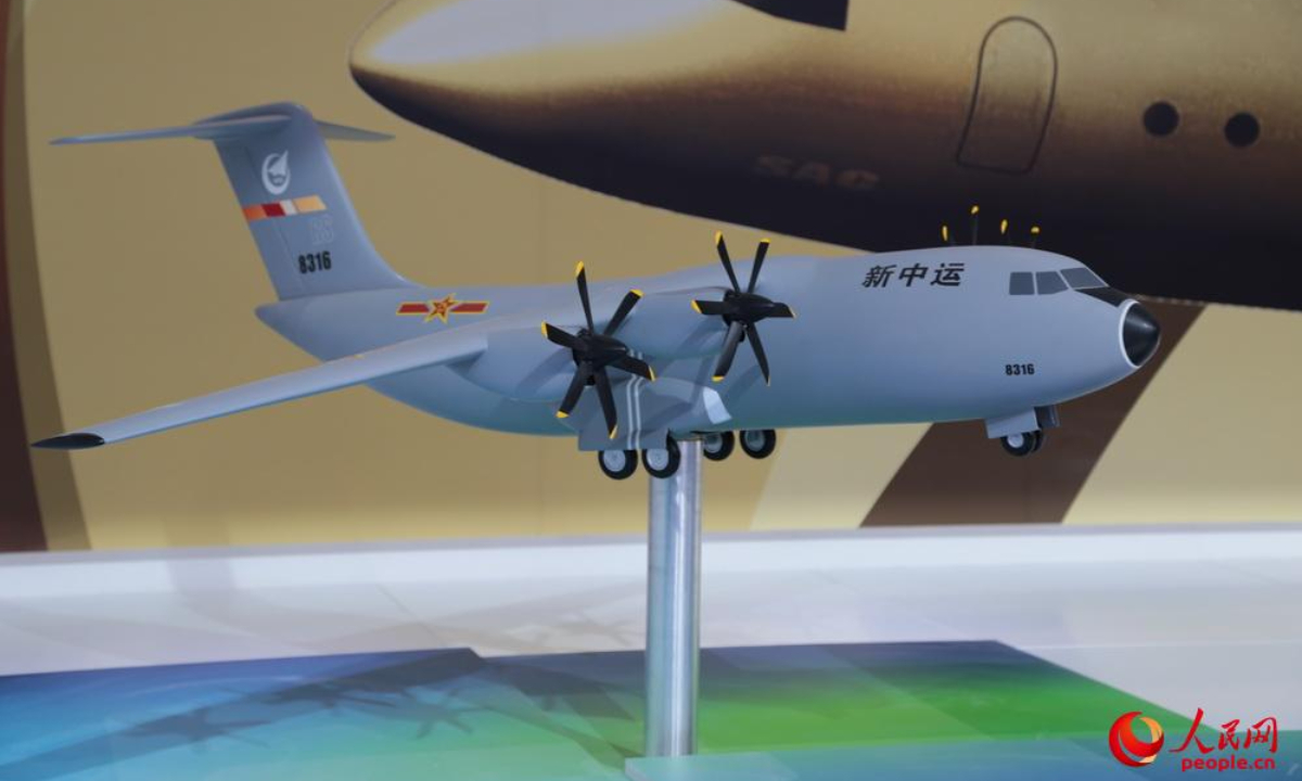 A scale model of a medium transport aircraft equipped with four turboprop engines is on display for the first time at the exhibiting area of the Aviation Industry Corporation of China at the Airshow China 2014 in Zhuhai, South China’s Guangdong Province. Photo: Screenshot from people.cn