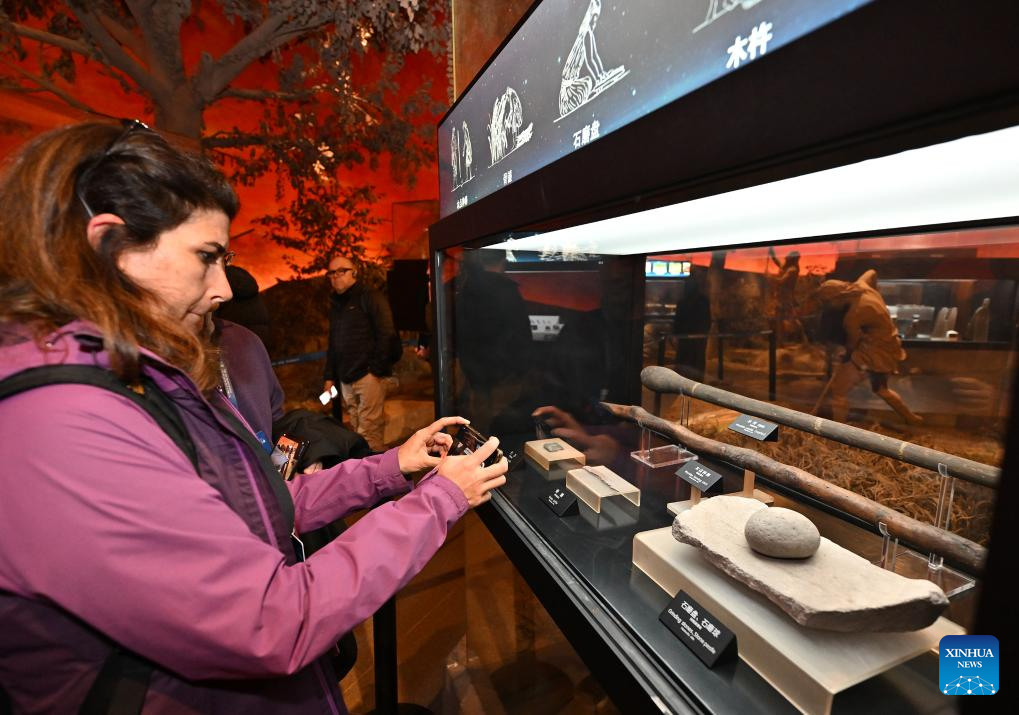 Experts and scholars attending the sixth Shanghai Archaeology Forum (SAF2025) visit the Hemudu Ruins Museum in Yuyao City of Ningbo, east China's Zhejiang Province, on Dec. 15, 2025. Jointly hosted by the Chinese Academy of Social Sciences, Shanghai Municipal People's Government and the National Cultural Heritage Administration of China, the SAF2025 themed on Technology, Society and Archaeology has attracted nearly 300 experts and scholars from over 40 countries and regions around the world to attend. (Xinhua/Li He)
