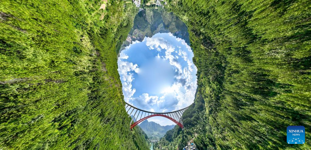 This aerial panoramic drone photo taken on Sept. 5, 2025 shows the Daxiaojing Grand Bridge in southwest China's Guizhou Province.
Guizhou, the only province in China without a single plain and home to deep ravines, has long relied on tunnels and bridges to overcome its jagged karst landscape.
Since 2012, the province has accelerated its bridge construction endeavors. Guizhou now has over 32,000 bridges either already built or under construction -- a tenfold increase compared to the 1980s.
Due to its sheer number of bridges, diverse bridge types and complex construction technologies, Guizhou has earned the title of the world's bridge museum. (Xinhua/Ou Dongqu)